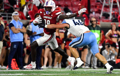 Kienholz leads as No. 24 Louisville routs Villanova 59-13 for first victory